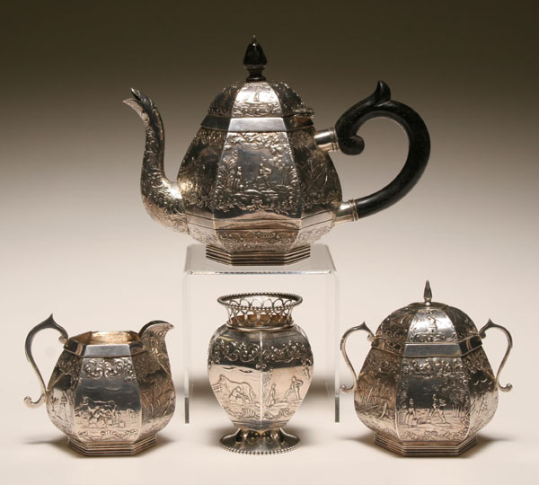 Appraisal: Dutch silver repousse tea service each piece with extensively decorated