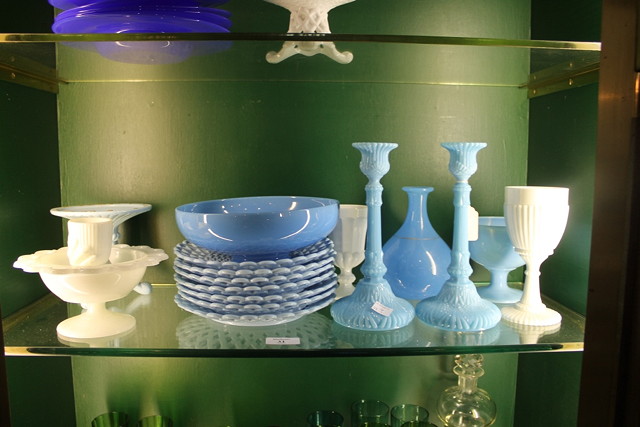 Appraisal: A COLLECTION OF PRESSED GLASS including blue candlesticks various plates