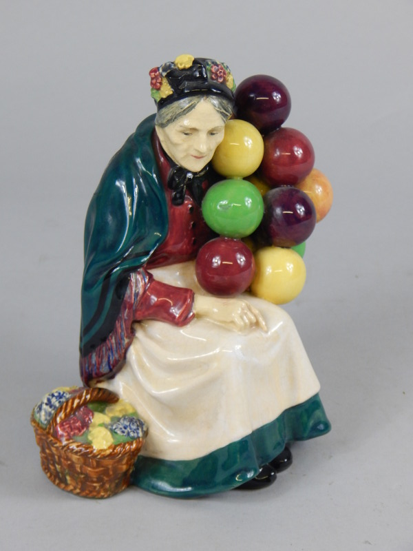 Appraisal: A Royal Doulton figure The Old Balloon Seller HN green