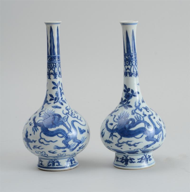 Appraisal: PAIR OF KANGXI BLUE AND WHITE PORCELAIN FOOTED PEAR-FORM VASES