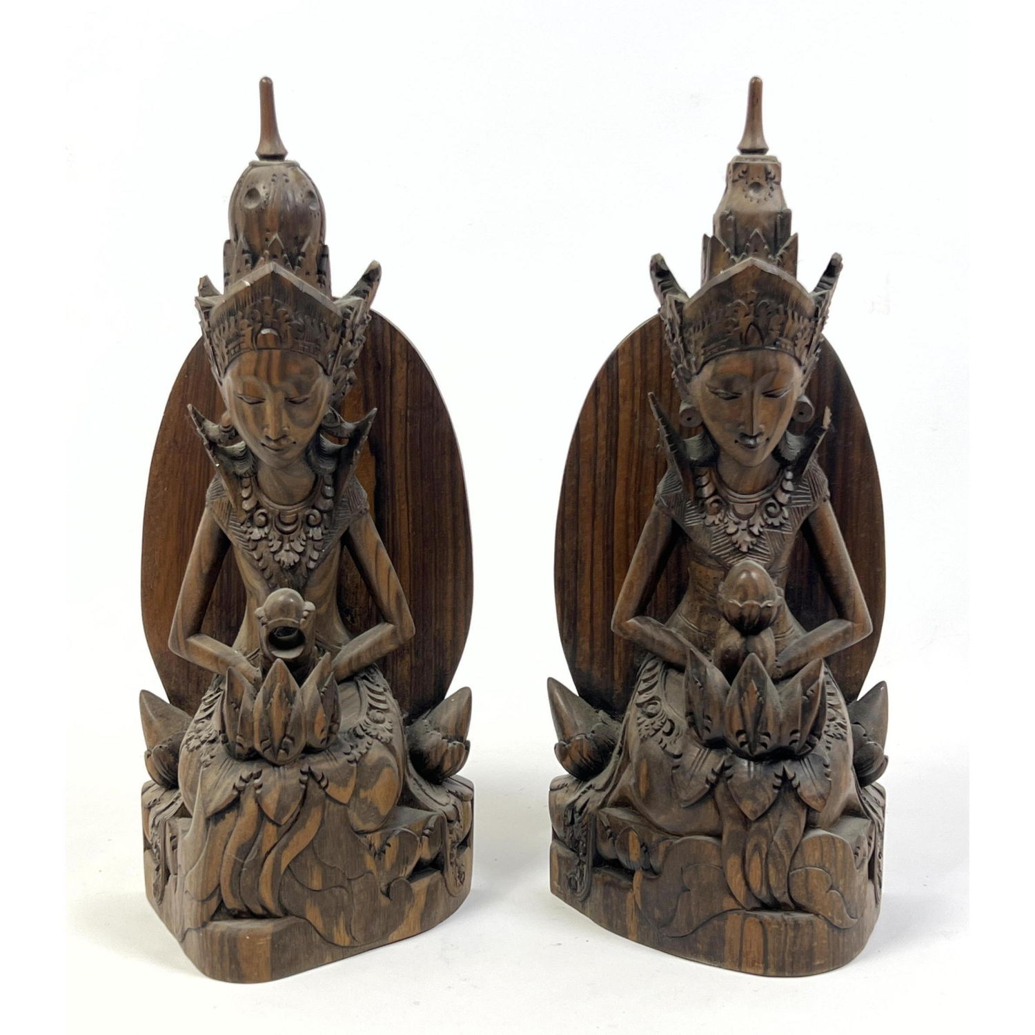 Appraisal: Pr Carved Wood Asian Figures Statues Possibly Thai Figures with