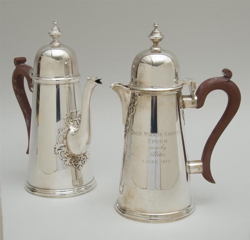 Appraisal: PAIR OF ENGLISH PRESENTATION SILVER LIGHTHOUSE-FORM COFFEE POTS IN THE