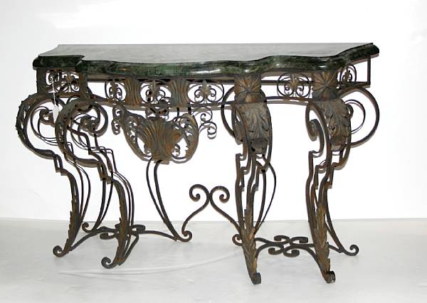 Appraisal: A Louis XV style wrought iron console with marble top