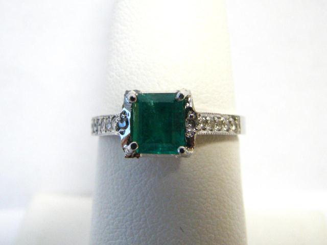 Appraisal: Lady's K white gold emerald and diamond ring with approximately