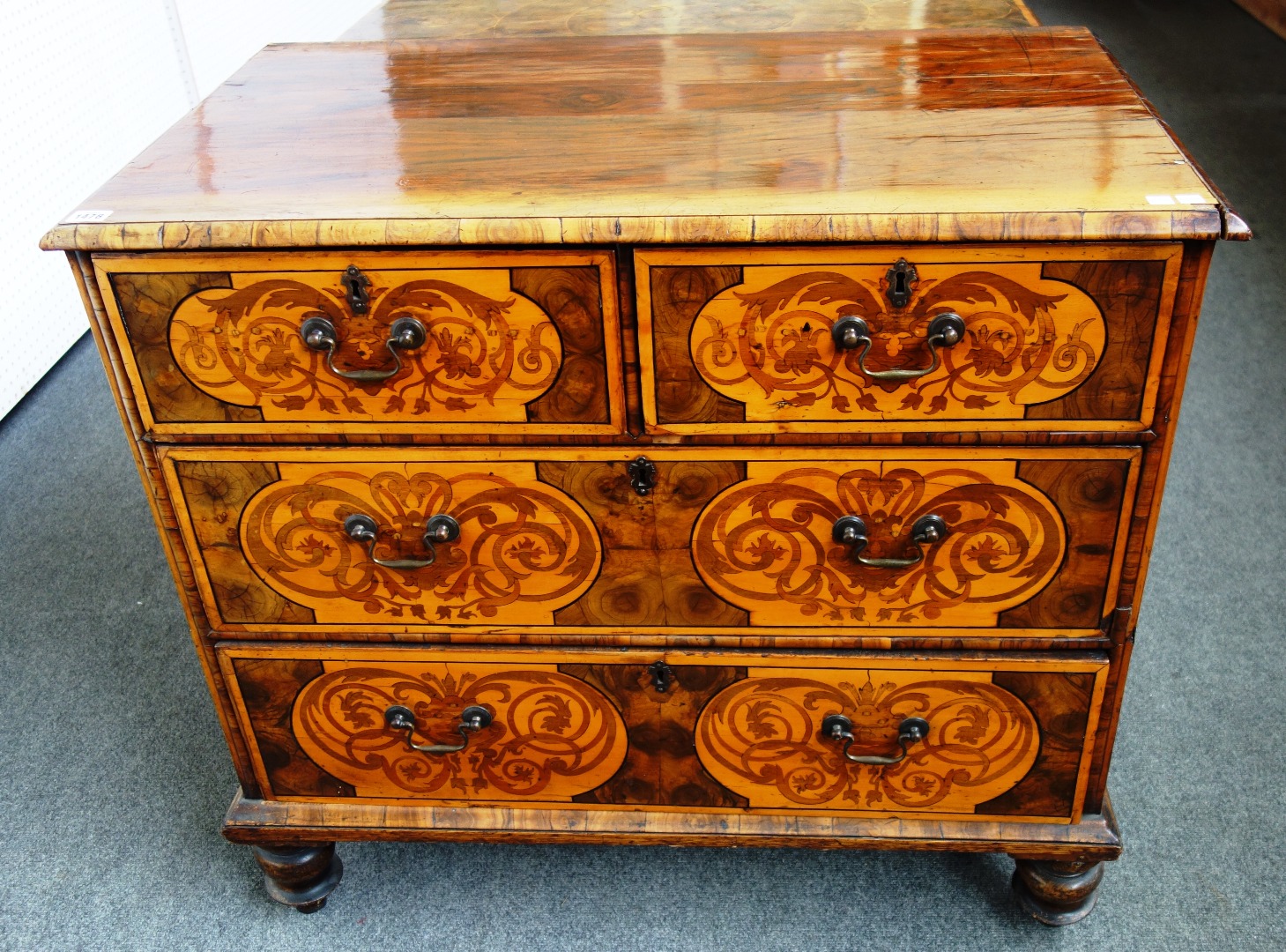 Appraisal: A th century and later marquetry inlaid oyster veneered chest