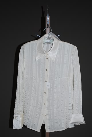 Appraisal: Escada ivory silk long sleeve blouse satin collar French cuffs