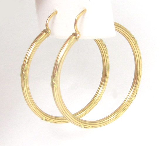 Appraisal: PAIR OF FOURTEEN KARAT GOLD HOOP EARRINGS each yellow gold