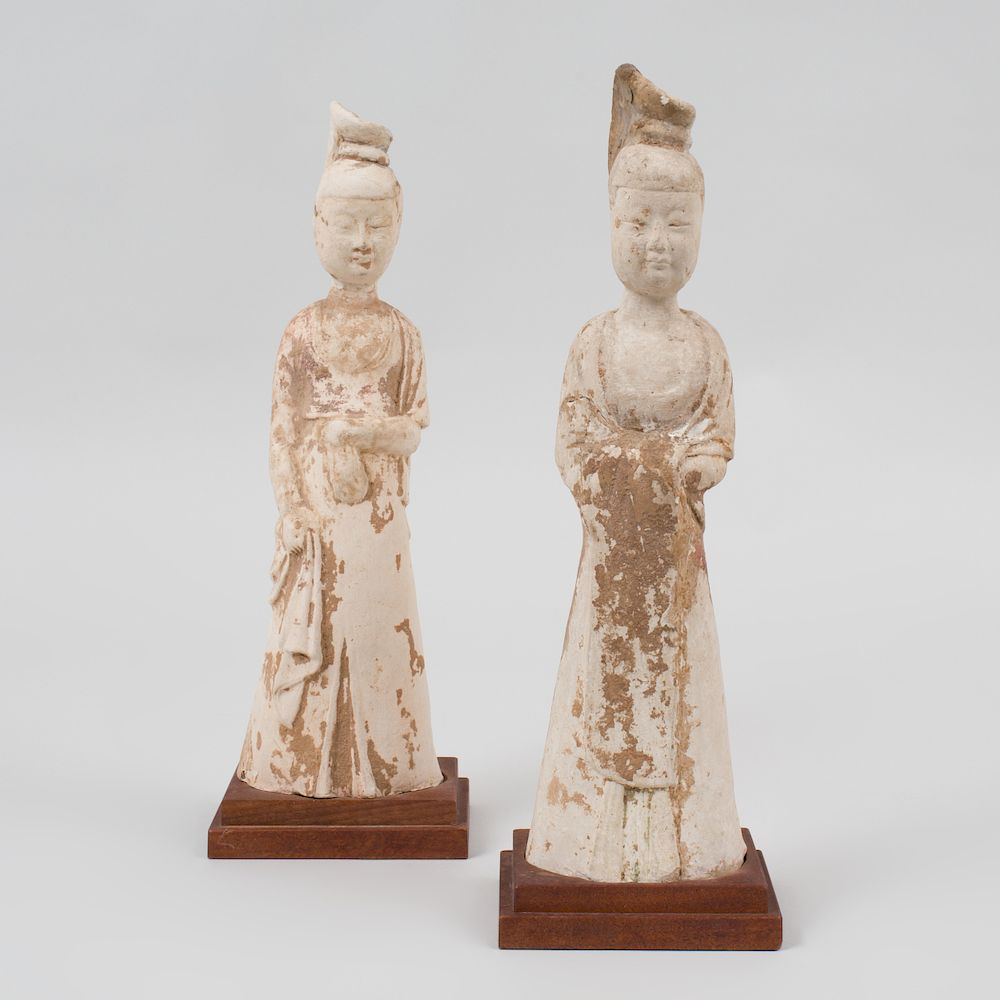 Appraisal: A Pair of Chinese Painted Pottery Figures of Court Ladies