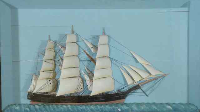 Appraisal: A wooden half ship model in the form of a