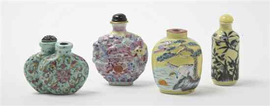 Appraisal: Four Porcelain Snuff Bottles two having raised molded decoration and