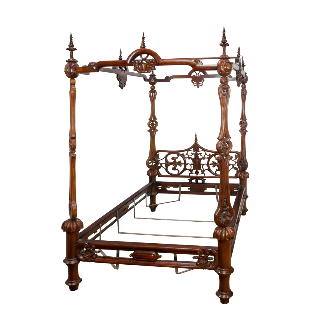 Appraisal: A ROCOCO REVIVAL CARVED AND PIERCE DECORATED FULL TESTER BED