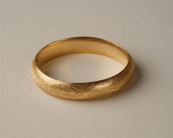 Appraisal: A Gold Hinged Bangle Bracelet K marked yellow gold with