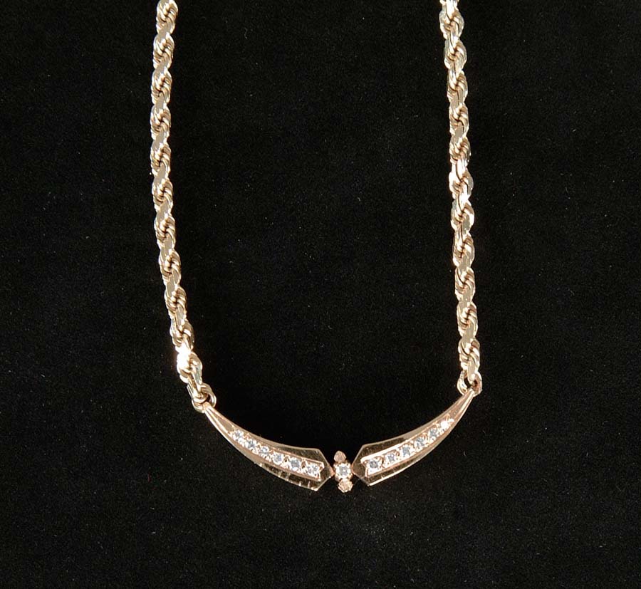 Appraisal: GOLD DIAMOND NECKLACE Heavy k yellow gold necklace has diamond