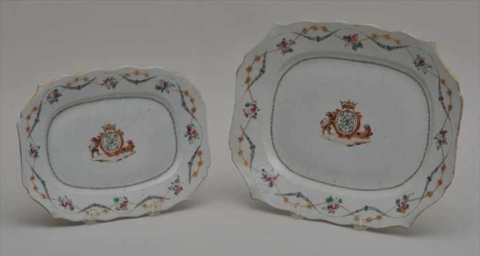 Appraisal: TWO CHINESE EXPORT PORCELAIN ARMORIAL GRADUATED PLATTERS Each with gilt-crowned