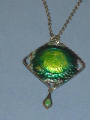 Appraisal: AN ART NOUVEAU SILVER ENAMEL PENDANT of diamond form the