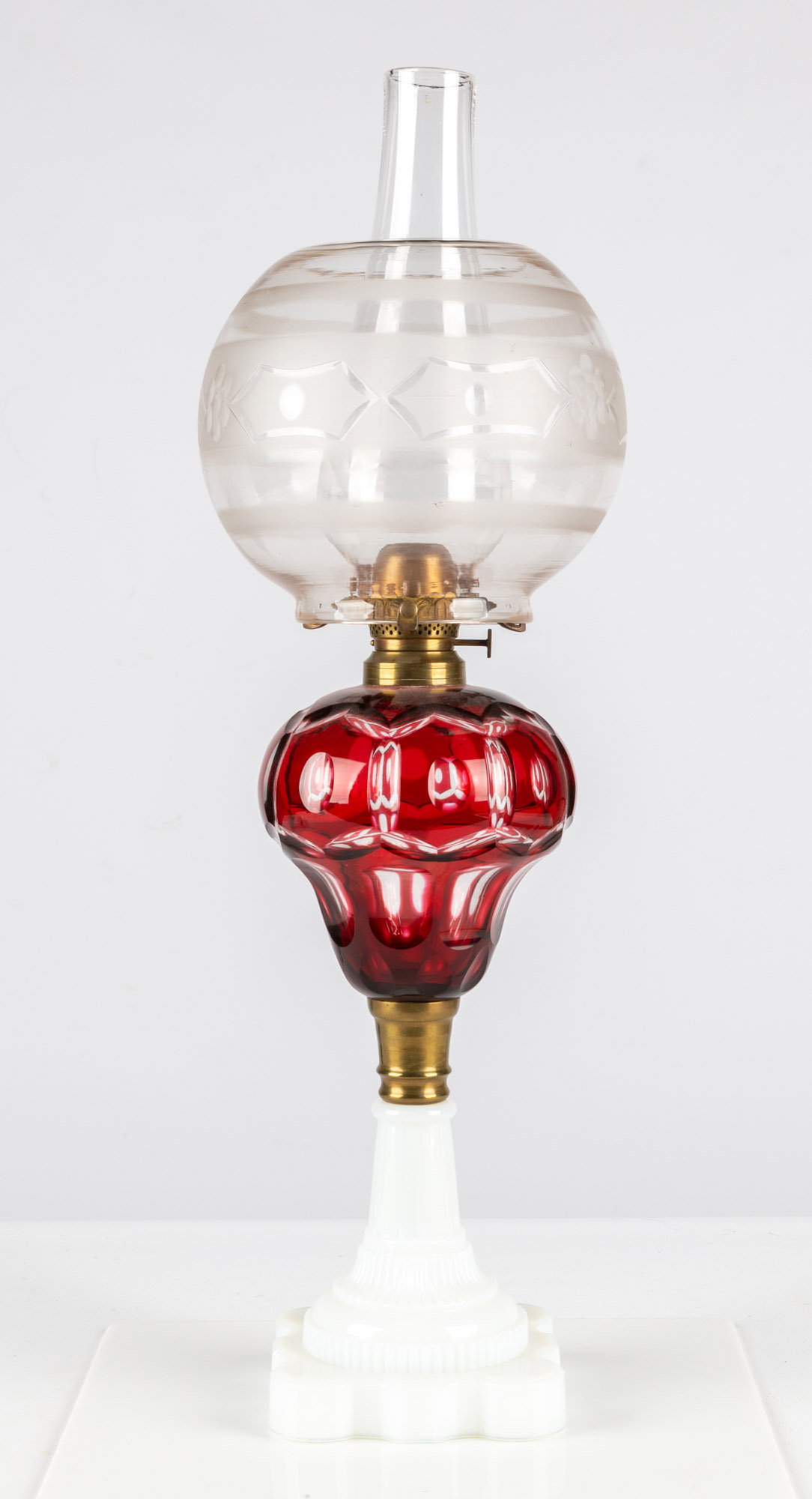 Appraisal: CRANBERRY WASHINGTON OVERLAY OIL LAMP circa Deep cranberry glass cut