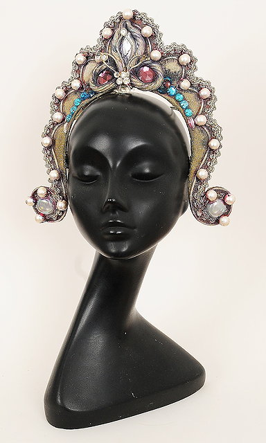 Appraisal: A elaborate silver headdress worn as part of a theatrical