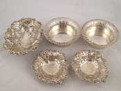 Appraisal: Silver A pair of coasters with pierced rims Birmingham a