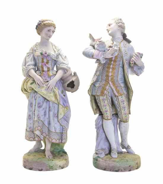 Appraisal: A Pair of French Bisque Porcelain Figurines depicting a gentleman