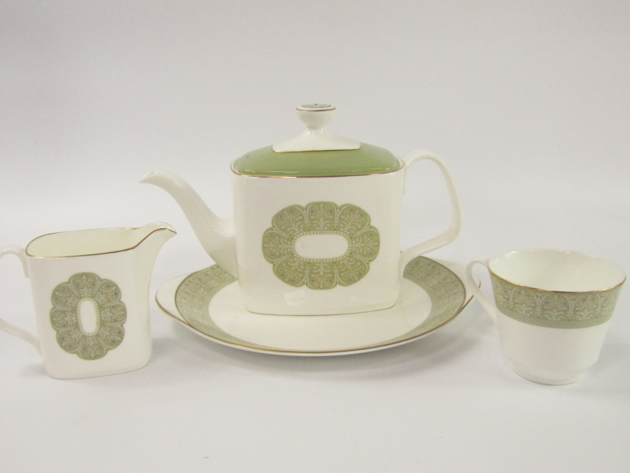 Appraisal: A Royal Doulton porcelain part dinner and tea service decorated