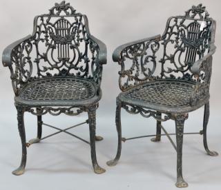 Appraisal: Pair of Victorian iron chairs with lyre type backs ht