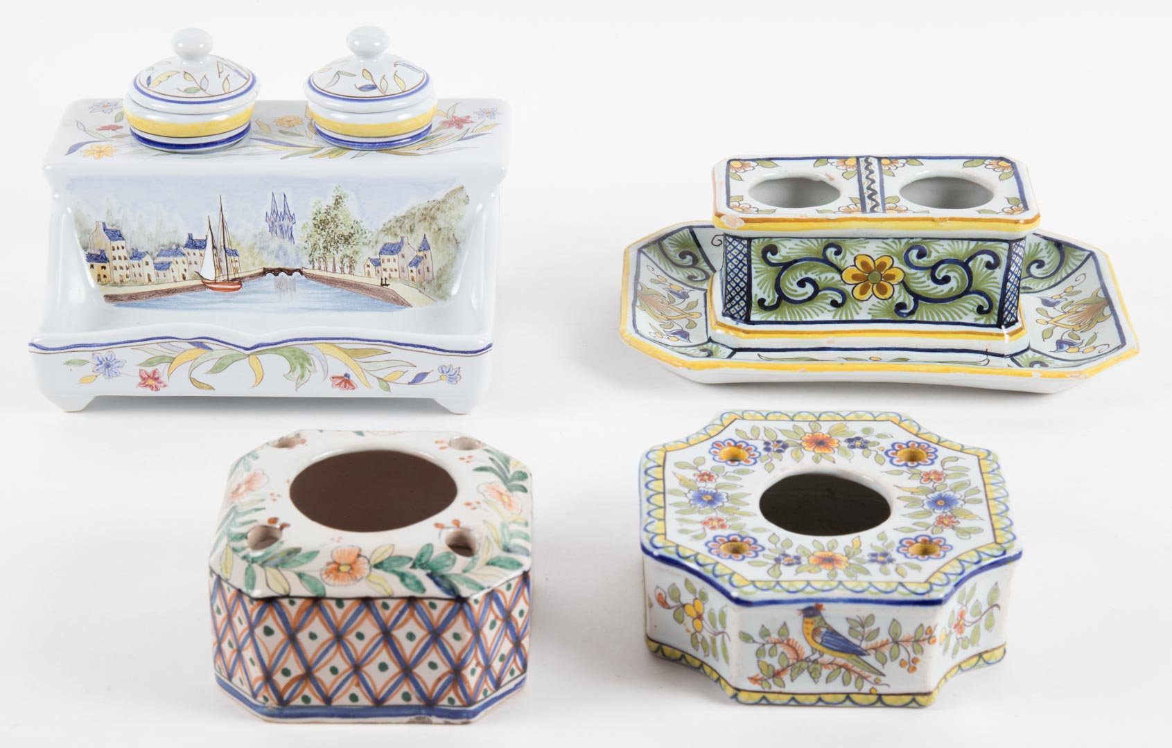 Appraisal: Four Quimper and French faience inkwells th century to in