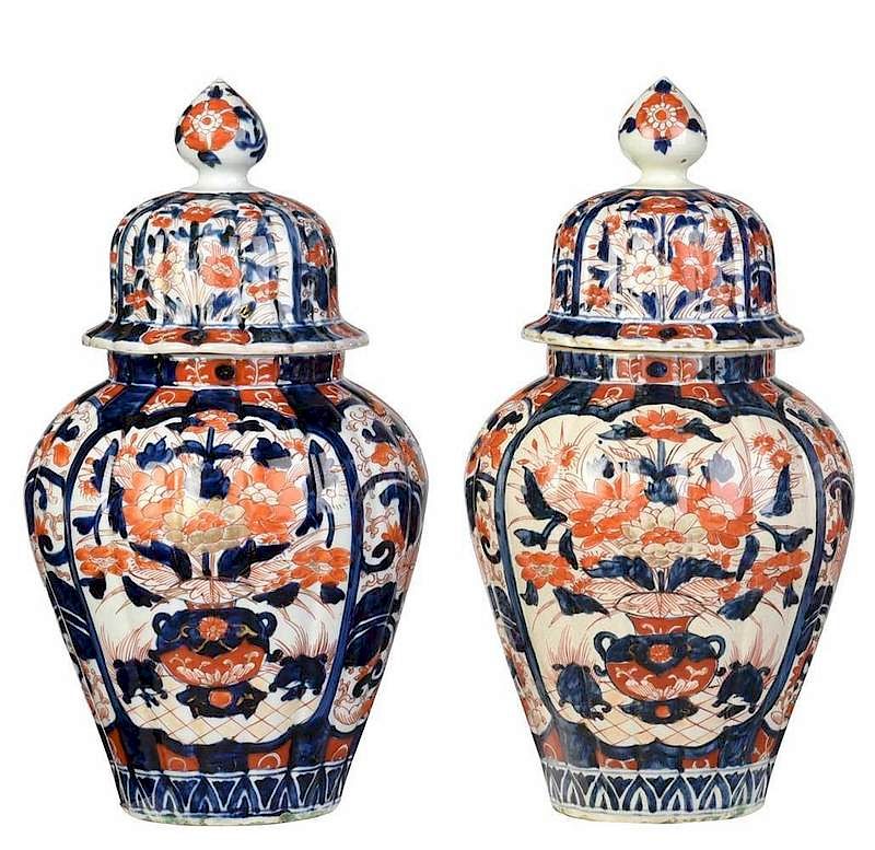 Appraisal: Near Pair of Japanese Imari Covered Urns th th century