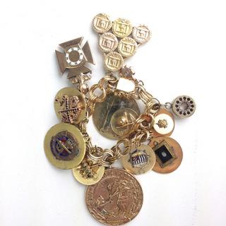 Appraisal: k yellow gold charm bracelet with various various charms and