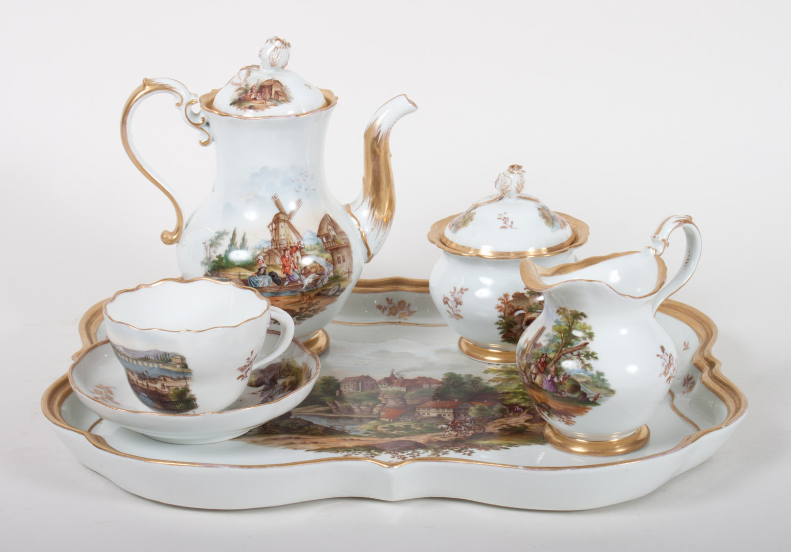 Appraisal: Meissen porcelain partial tea set early th century each piece