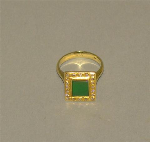 Appraisal: CHINESE GOLD AND JADE RING The jade of dark rich