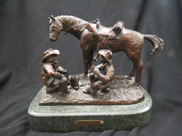 Appraisal: Bronze Statue of Cowboys after Barye at rest horse beside