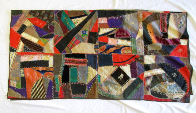 Appraisal: AMERICAN HAND PIECED CRAZY QUILT c having blocks of velvet