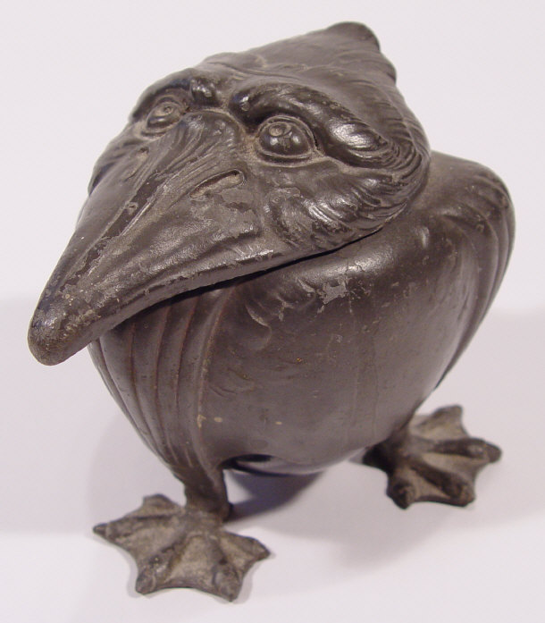 Appraisal: Art Nouveau pewter grotesque bird inkwell the hinged head resting