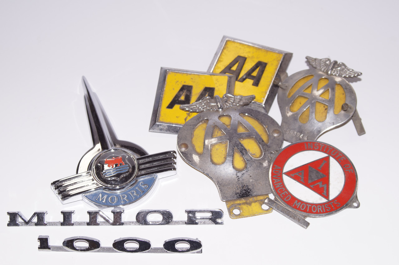 Appraisal: A collection of automobilia badges including a Morris car badge