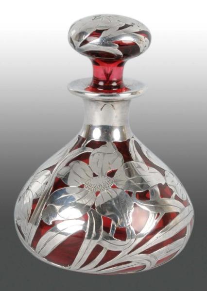 Appraisal: Cranberry Art Glass Bottle Perfume Bottle Description Marked Sterling One