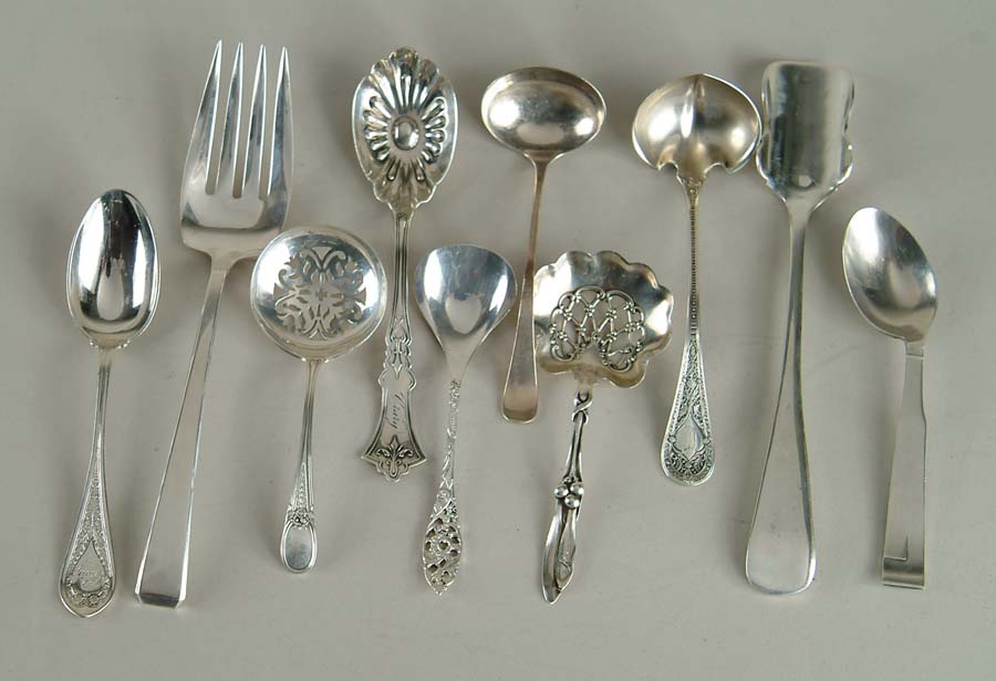 Appraisal: NINE PIECES OF STERLING FLATWARE Lot consists of two pierced