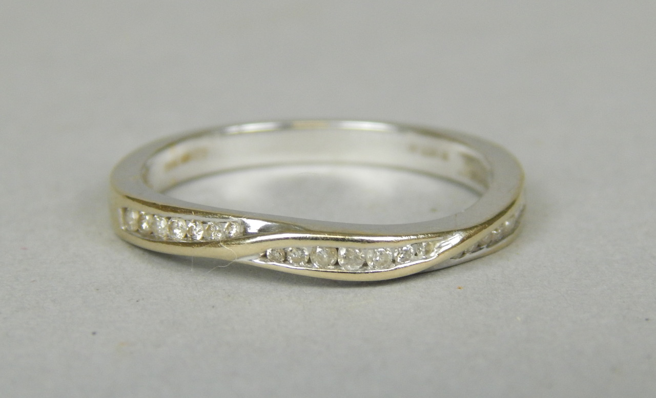 Appraisal: An ct white gold import diamond set half hoop eternity