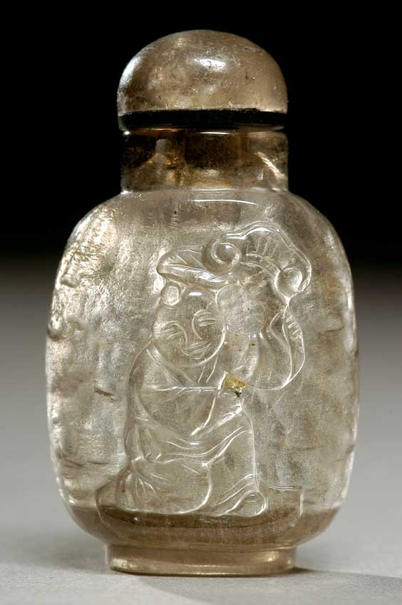 Appraisal: SMOKEY CRYSTAL SNUFF BOTTLE Finely hollowed and carved smokey crystal