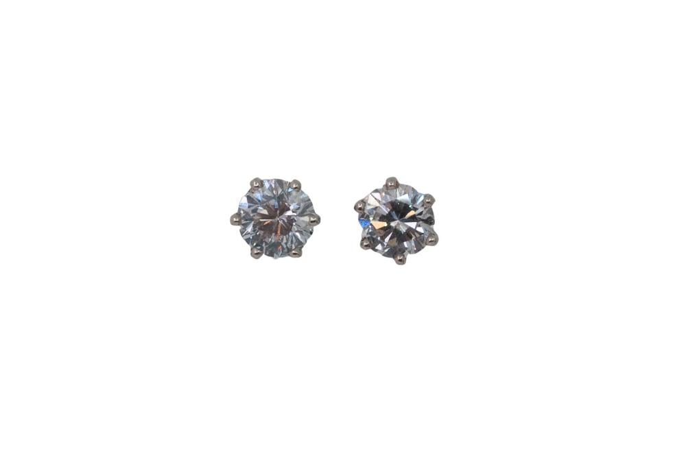 Appraisal: PAIR OF DIAMOND STUDSround brilliant-cut diamond stud earrings weighing approximately