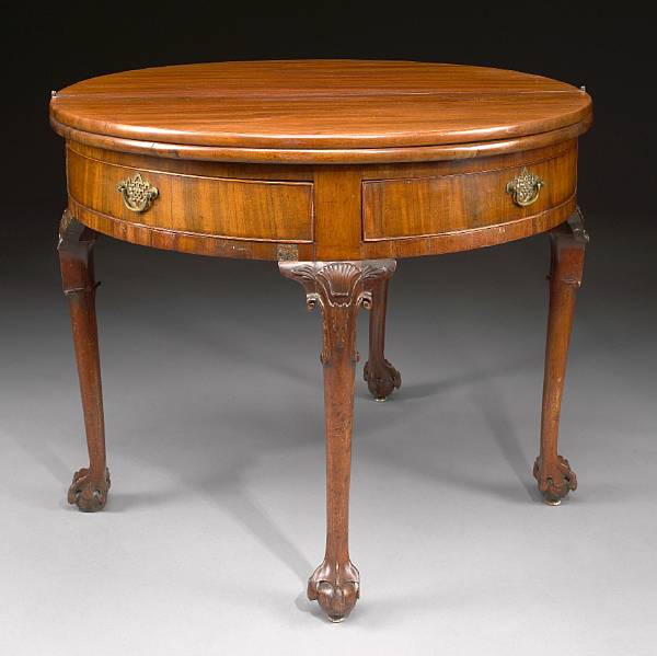 Appraisal: A George II walnut triple fold top games and tea