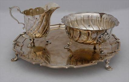 Appraisal: ENGLISH SILVER SALVER AND A CREAMER AND SUGAR SET Crichton