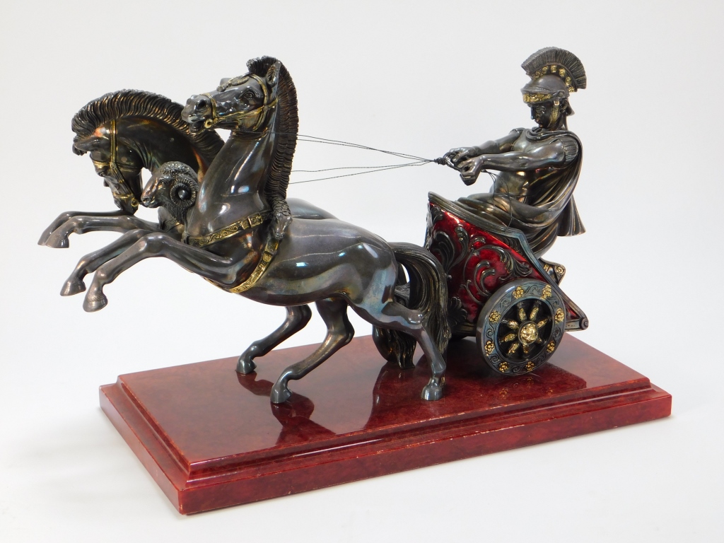 Appraisal: ARNALDO GIANNELLI SILVERED METAL CHARIOT SCULPTURE Italy th CenturyDepicts a