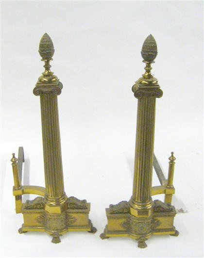 Appraisal: Pair of Neoclassical style brass andirons th century Of ionic