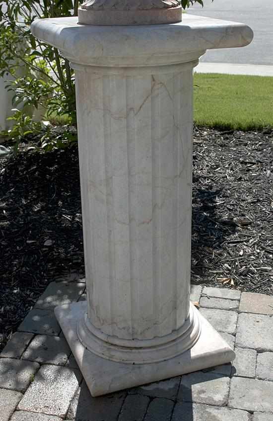 Appraisal: Pair white and red-veined marble columns bullnose platform on fluted