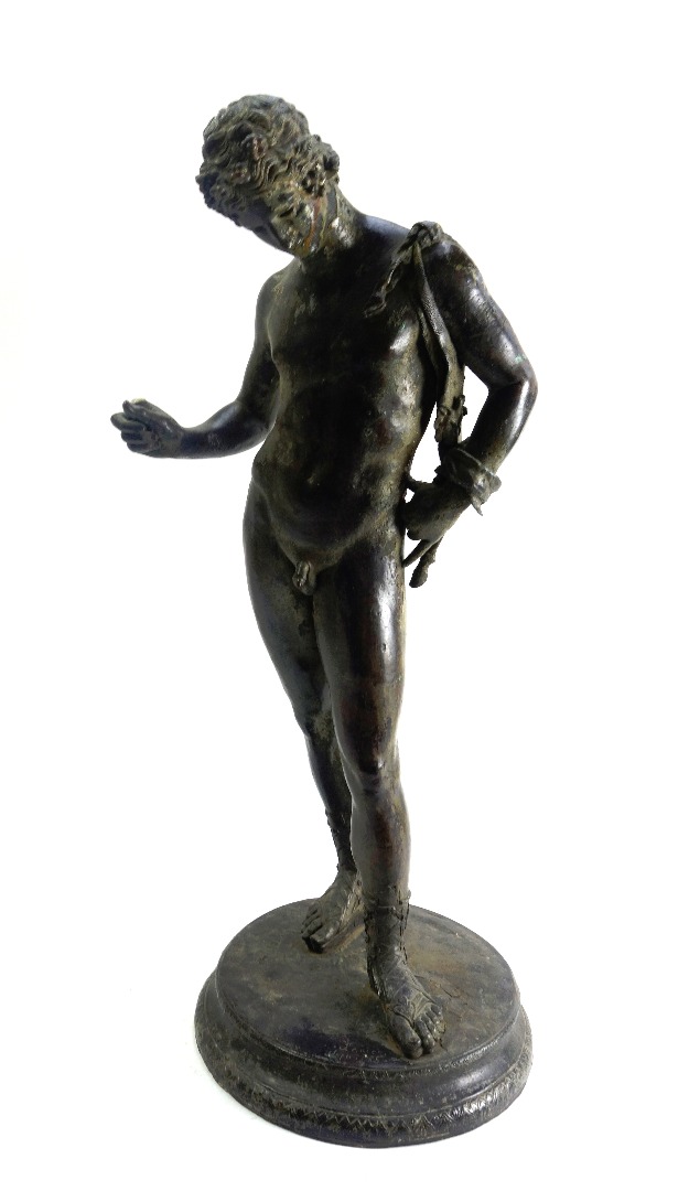 Appraisal: An Italian patinated bronze figure of 'Narcissus' signed 'S Erico