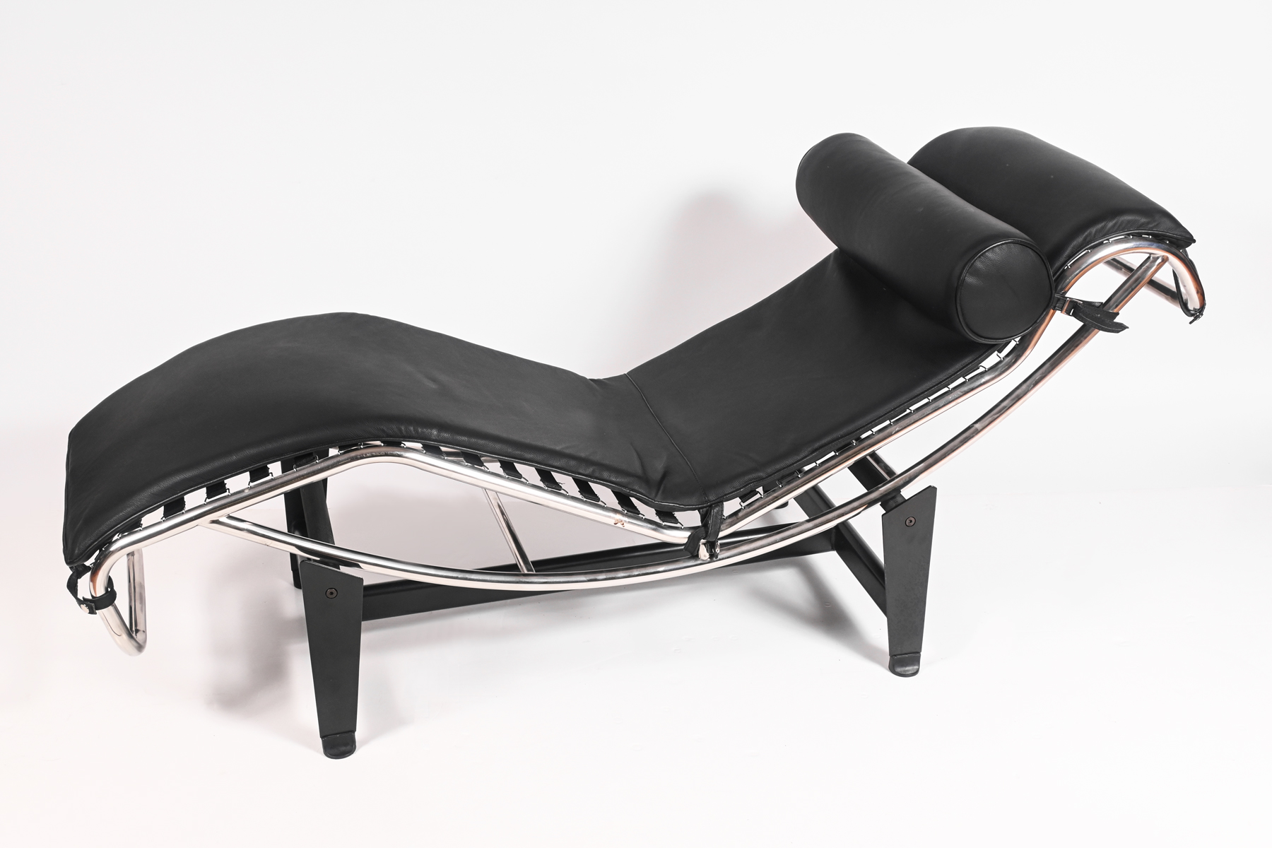 Appraisal: LE CORBUSIER STYLE FAUX LEATHER CHROME CHAISE Le Corbusier style