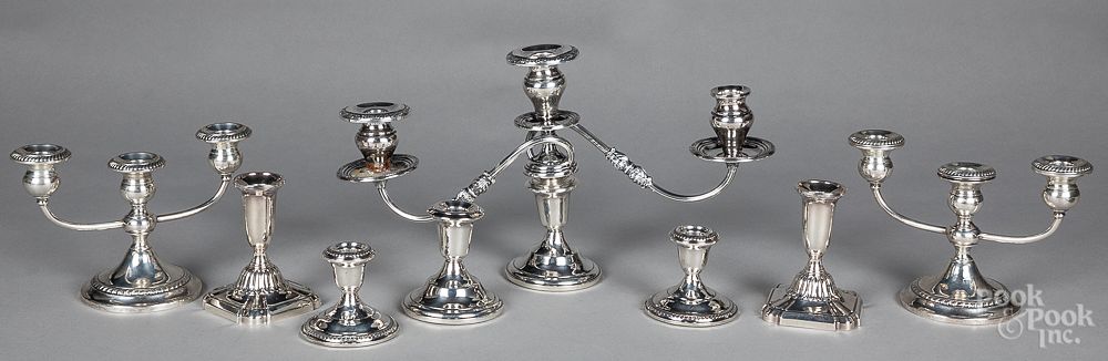 Appraisal: Four pairs of weighted sterling silver candlestic Four pairs of