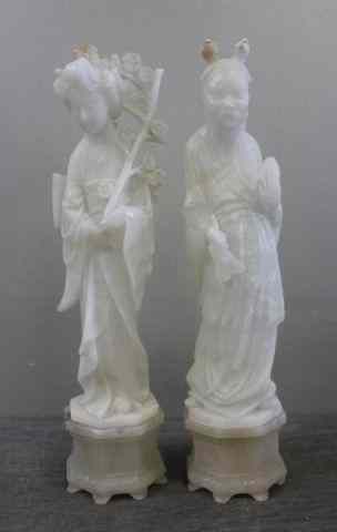 Appraisal: Pair of White Alabaster Jadeite Asian Figures From a Garden