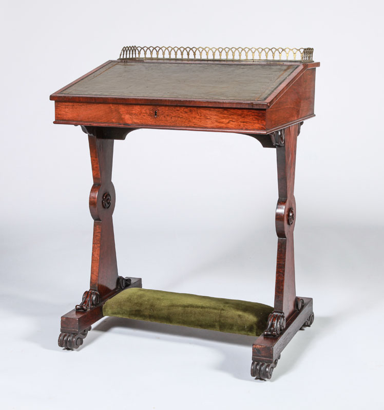 Appraisal: VICTORIAN ROSEWOOD STUDENT'S DESK The slant front writing surface opening