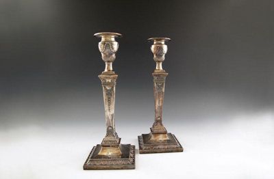 Appraisal: A pair of Victorian silver candlesticks by Hawksworth Eyre and